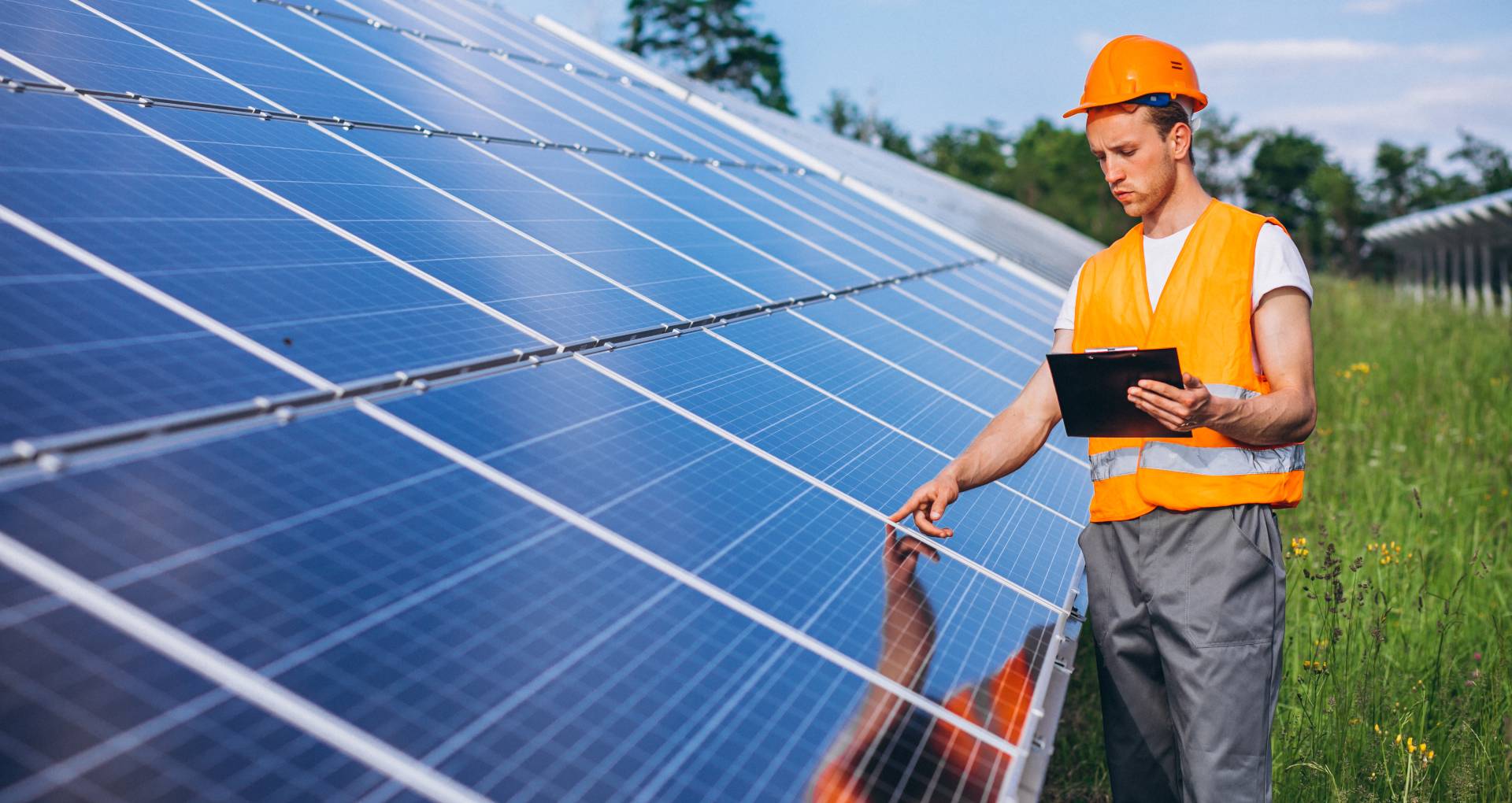 man-worker-firld-by-solar-panels (2)